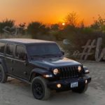 Jeep at sunset in the desert